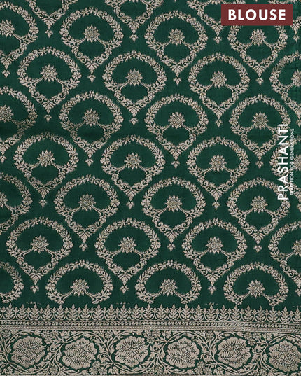 Dola silk saree bottle green with plain body and zari woven border