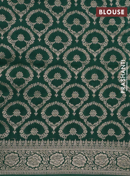 Dola silk saree bottle green with plain body and zari woven border