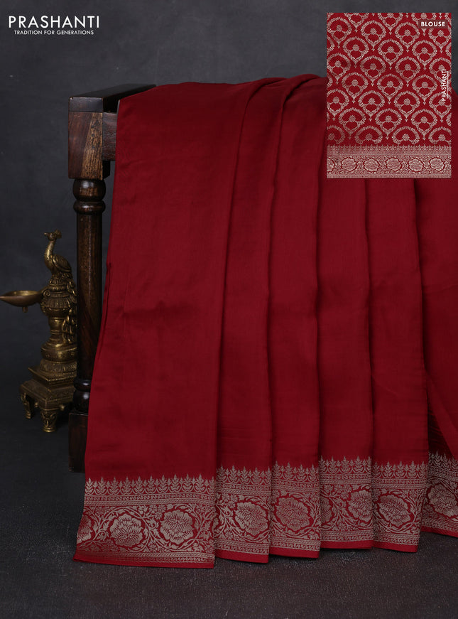 Dola silk saree red with plain body and zari woven border