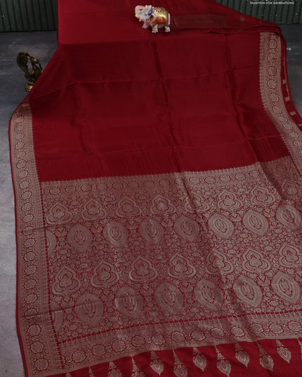 Dola silk saree red with plain body and zari woven border