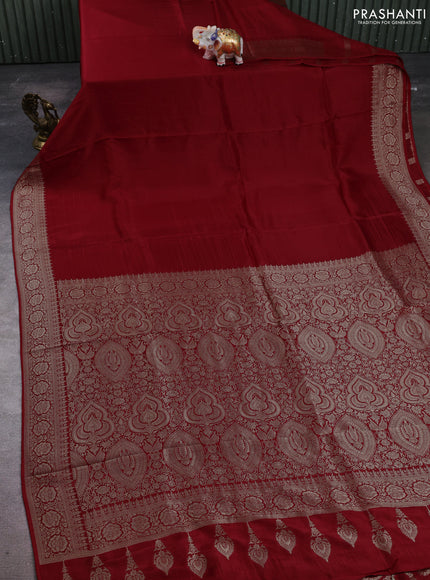 Dola silk saree red with plain body and zari woven border