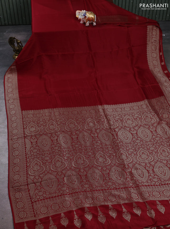 Dola silk saree red with plain body and zari woven border