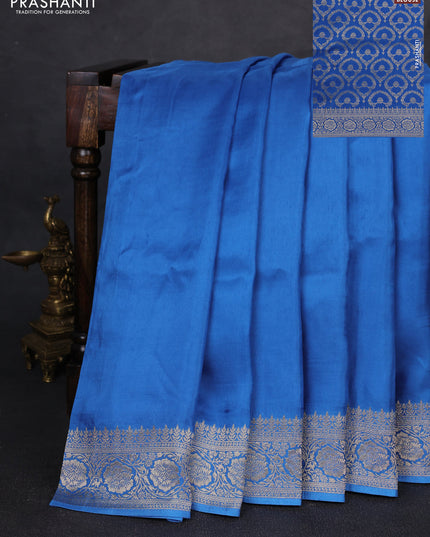 Dola silk saree blue with plain body and zari woven border