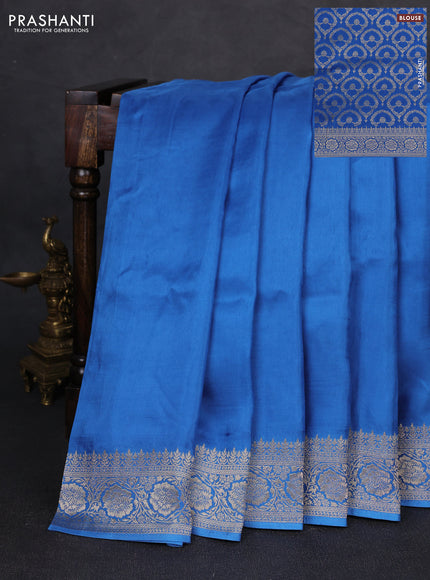 Dola silk saree blue with plain body and zari woven border
