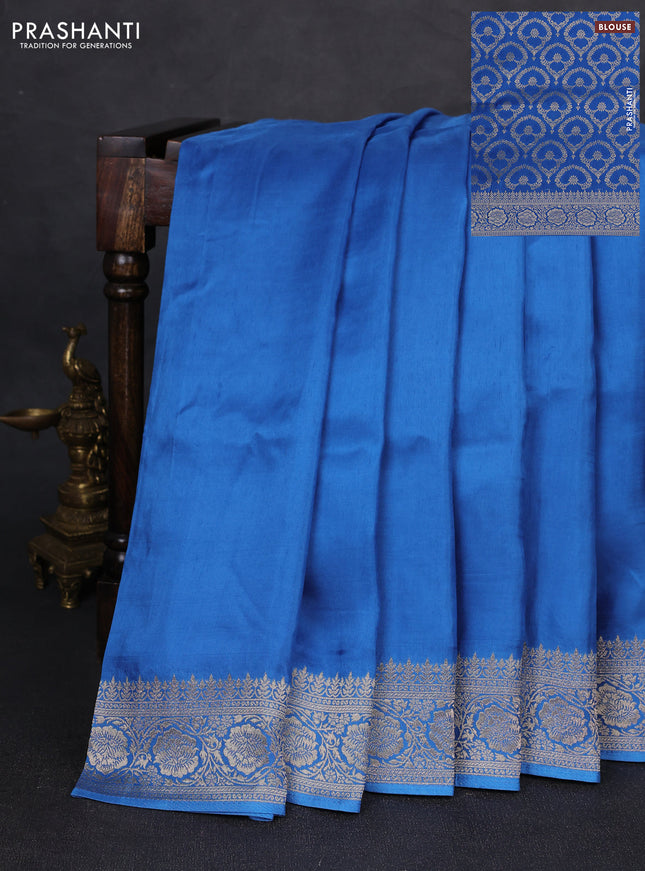 Dola silk saree blue with plain body and zari woven border