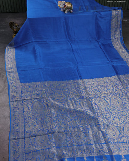 Dola silk saree blue with plain body and zari woven border