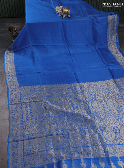 Dola silk saree blue with plain body and zari woven border
