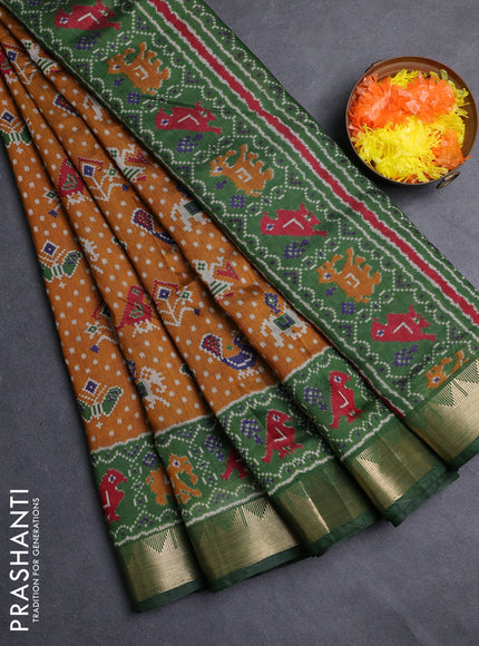 Semi maheshwari cotton saree mustard yellow and green with allover patola prints and zari woven border