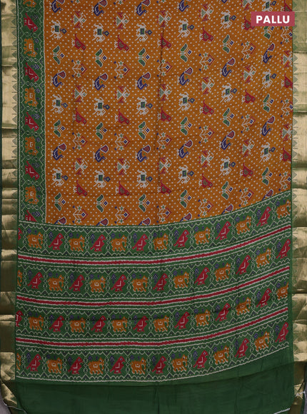 Semi maheshwari cotton saree mustard yellow and green with allover patola prints and zari woven border