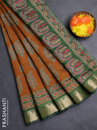 Semi maheshwari cotton saree dark mustard and green with allover floral prints and zari woven border