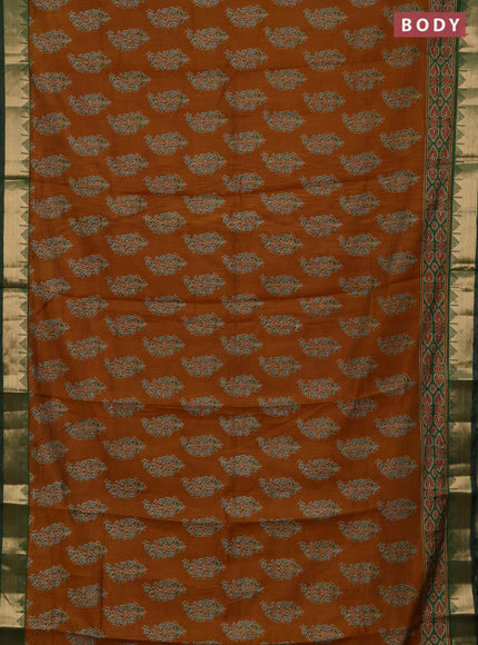 Semi maheshwari cotton saree dark mustard and green with allover floral prints and zari woven border