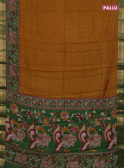 Semi maheshwari cotton saree mustard yellow and green with allover ikat prints and zari woven border
