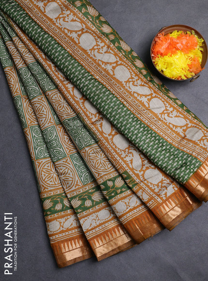 Semi maheshwari cotton saree light green and mustard yellow with allover ajrakh prints and zari woven border