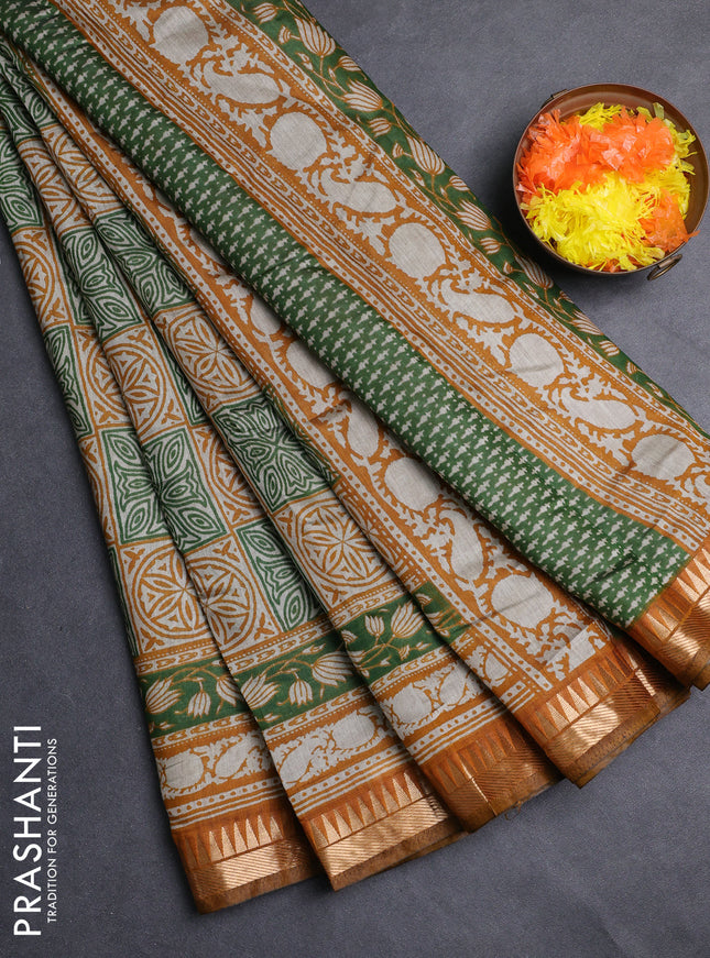 Semi maheshwari cotton saree light green and mustard yellow with allover ajrakh prints and zari woven border