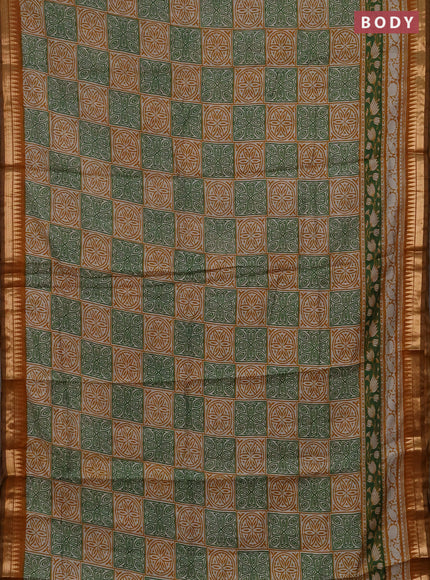 Semi maheshwari cotton saree light green and mustard yellow with allover ajrakh prints and zari woven border