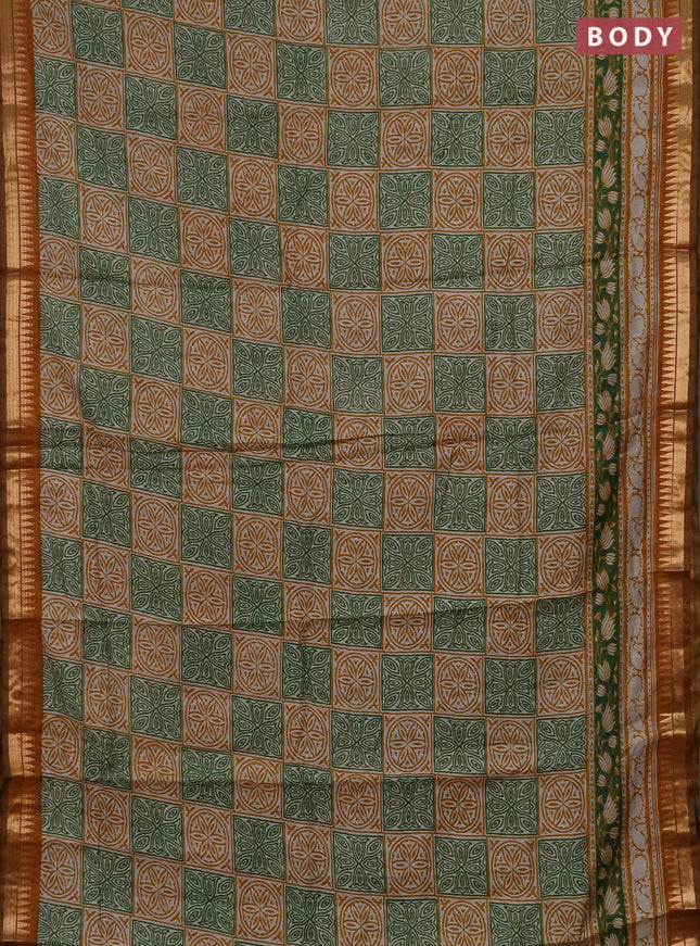 Semi maheshwari cotton saree light green and mustard yellow with allover ajrakh prints and zari woven border