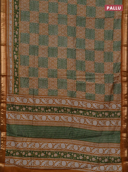 Semi maheshwari cotton saree light green and mustard yellow with allover ajrakh prints and zari woven border