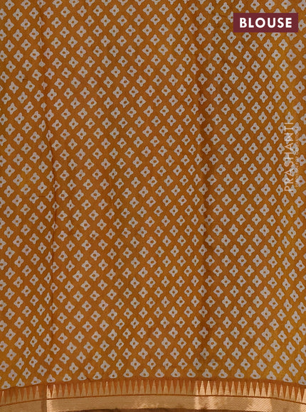 Semi maheshwari cotton saree light green and mustard yellow with allover ajrakh prints and zari woven border