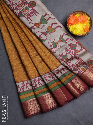 Semi maheshwari cotton saree mustard yellow and maroon with allover warli prints and zari woven border
