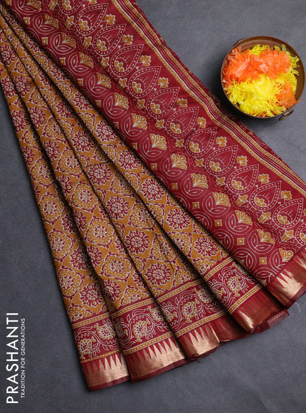 Semi maheshwari cotton saree mustard yellow and maroon with allover ajrakh prints and zari woven border