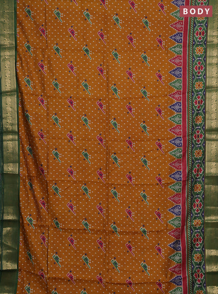 Semi maheshwari cotton saree mustard yellow and green with allover patola prints and zari woven border