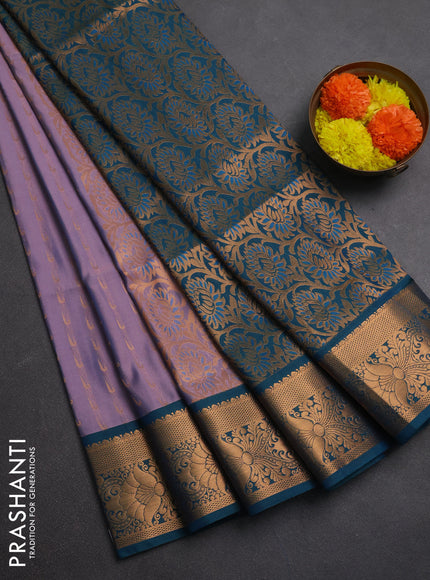 Semi soft silk saree lavender and teal blue with allover zari woven muniya buttas and zari woven border