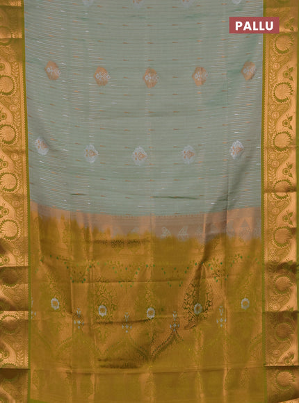 Semi soft silk saree pastel green and light green with allover silver & gold zari weaves & buttas and zari woven border