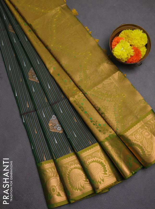 Semi soft silk saree bottle green and lime green with allover silver & gold zari weaves & buttas and zari woven border