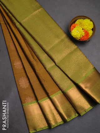 Semi soft silk saree dark mustard and green with allover zari weaves & buttas and rich zari woven border