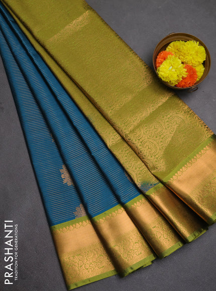 Semi soft silk saree peacock blue and green with allover zari weaves & buttas and rich zari woven border
