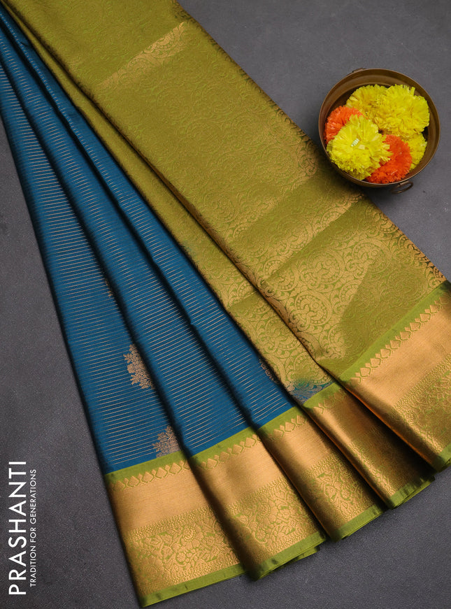 Semi soft silk saree peacock blue and green with allover zari weaves & buttas and rich zari woven border