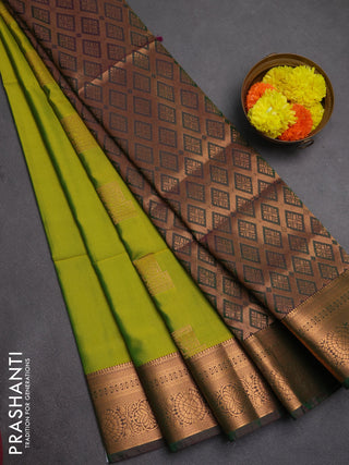 Semi soft silk saree light green and bottle green with zari woven buttas and zari woven border