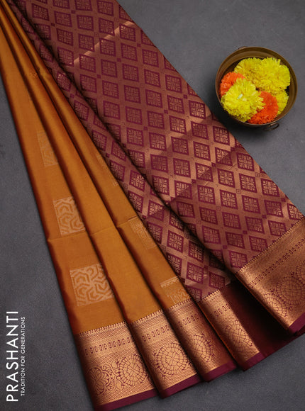 Semi soft silk saree dark mustard and wine shade with zari woven buttas and zari woven border
