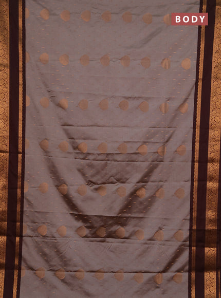 Semi soft silk saree grey and coffee brown with allover zari woven buttas and rettapet zari woven border