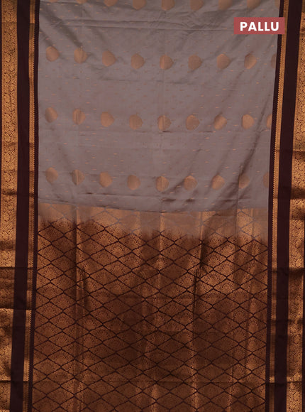 Semi soft silk saree grey and coffee brown with allover zari woven buttas and rettapet zari woven border