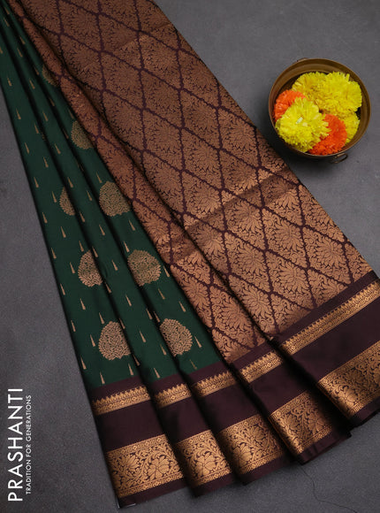 Semi soft silk saree bottle green and coffee brown with allover zari woven buttas and rettapet zari woven border