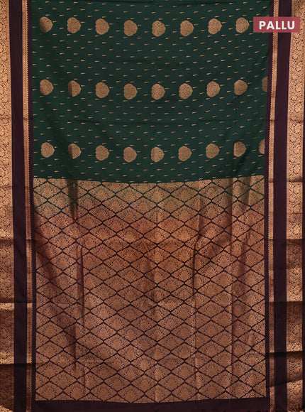 Semi soft silk saree bottle green and coffee brown with allover zari woven buttas and rettapet zari woven border