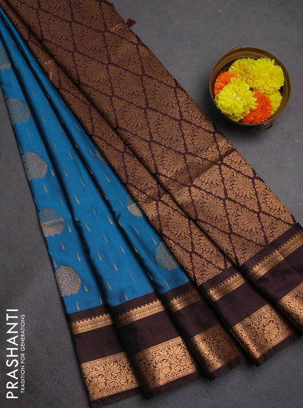 Semi soft silk saree peacock blue and coffee brown with allover zari woven buttas and rettapet zari woven border