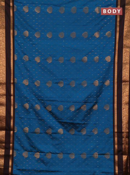 Semi soft silk saree peacock blue and coffee brown with allover zari woven buttas and rettapet zari woven border