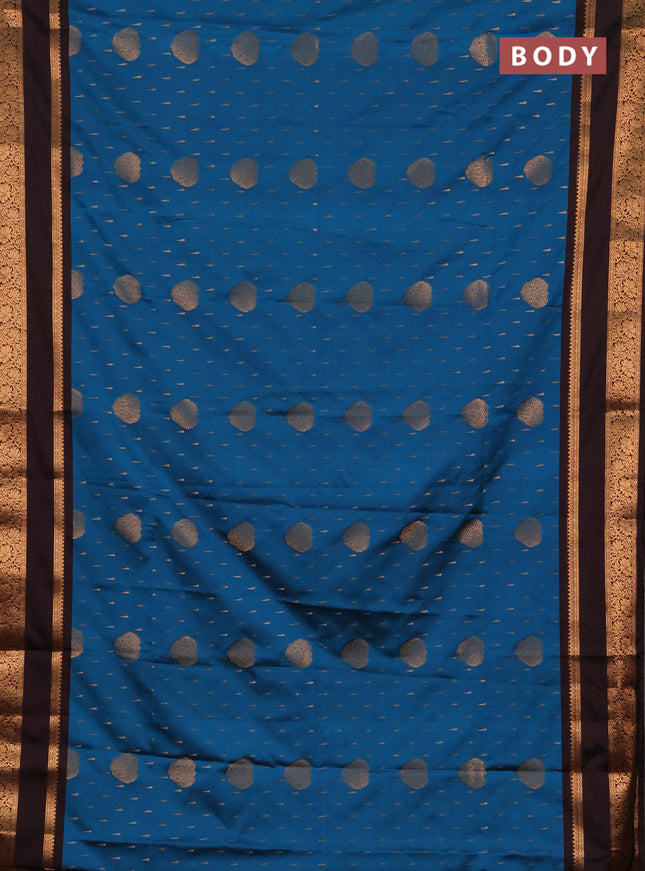 Semi soft silk saree peacock blue and coffee brown with allover zari woven buttas and rettapet zari woven border