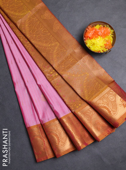 Semi soft silk saree light pink and dark mustard with zari woven buttas and zari woven border