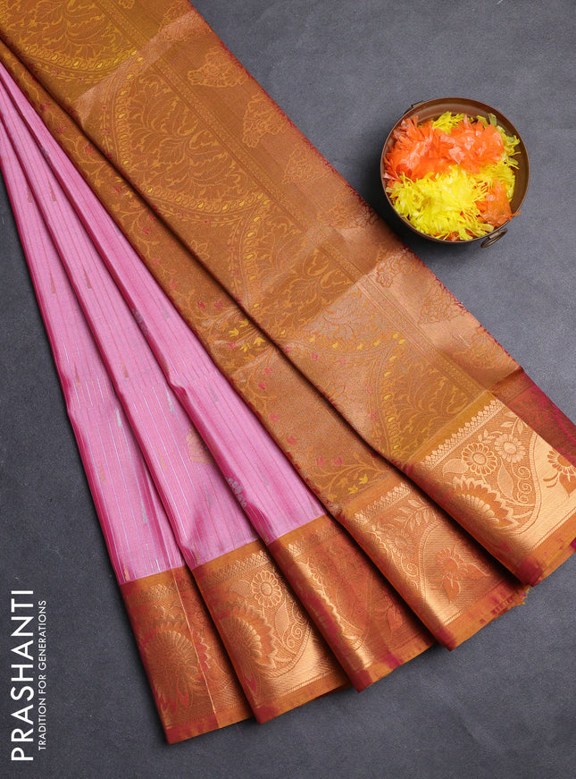Semi soft silk saree light pink and dark mustard with zari woven buttas and zari woven border