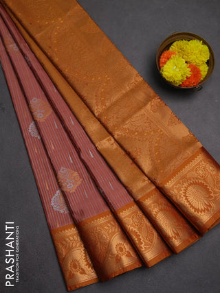 Semi soft silk saree peach pink and rustic orange with allover silver & gold zari weaves & buttas and zari woven border