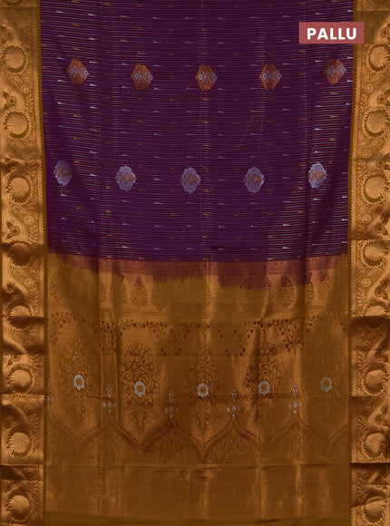 Semi soft silk saree deep purple and dark mustard with allover silver & gold zari weaves & buttas and zari woven border