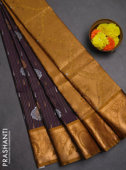 Semi soft silk saree deep jamun and dark mustard with allover silver & gold zari weaves & buttas and zari woven border