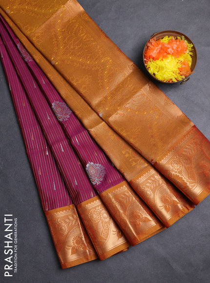 Semi soft silk saree wine shade and rustic orange with allover silver & gold zari weaves & buttas and zari woven border