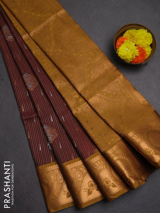 Semi soft silk saree deep maroon and dark mustard with allover silver & gold zari weaves & buttas and zari woven border