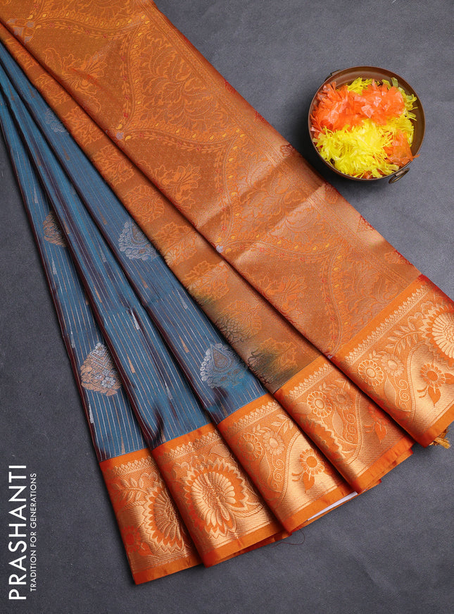 Semi soft silk saree peacock green and rustic orange with allover silver & gold zari weaves & buttas and zari woven border