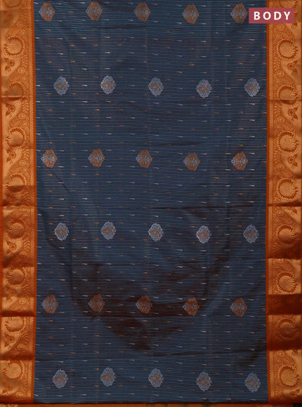Semi soft silk saree peacock green and rustic orange with allover silver & gold zari weaves & buttas and zari woven border