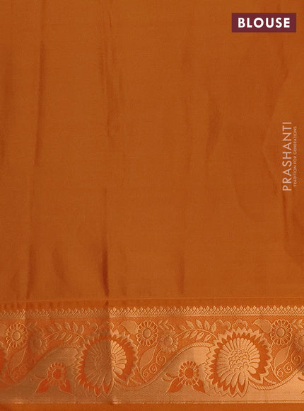 Semi soft silk saree peacock green and rustic orange with allover silver & gold zari weaves & buttas and zari woven border